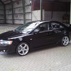 Mitsubishi lancer 1.8 solgt