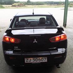 Mitsubishi lancer 1.8 solgt