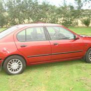 Nissan primera 2,0 solgt