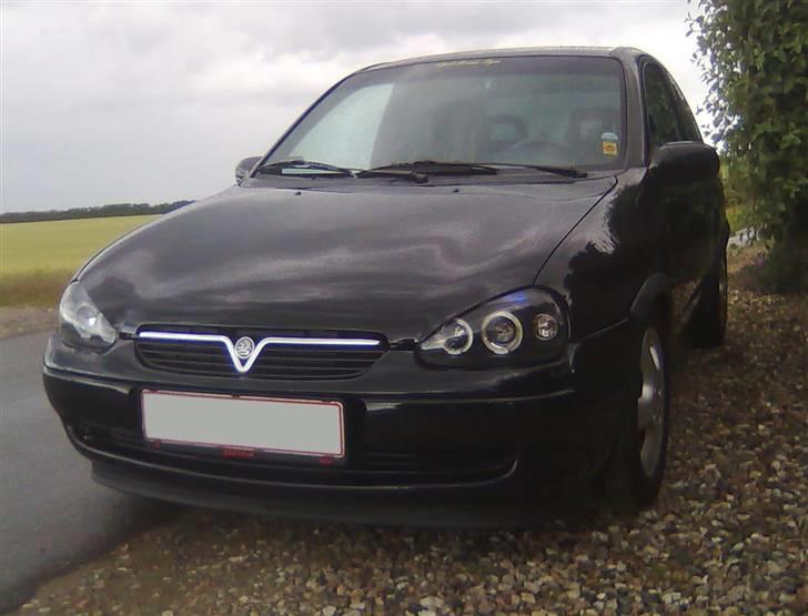 Opel Corsa B 1.4I 16v Sport - Blå dioder øverst i lygtene billede 13