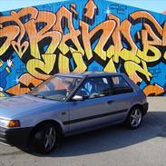 Mazda 323 solgt 