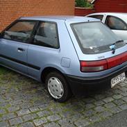 Mazda 323 solgt 
