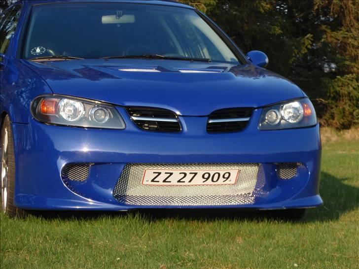 Nissan Almera 1,8 Sport SOLGT billede 1