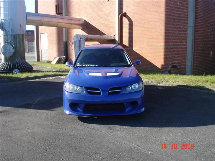 Nissan Almera 1,8 Sport SOLGT billede 3