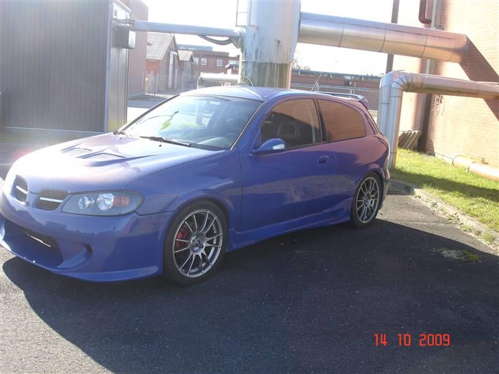 Nissan Almera 1,8 Sport SOLGT billede 4