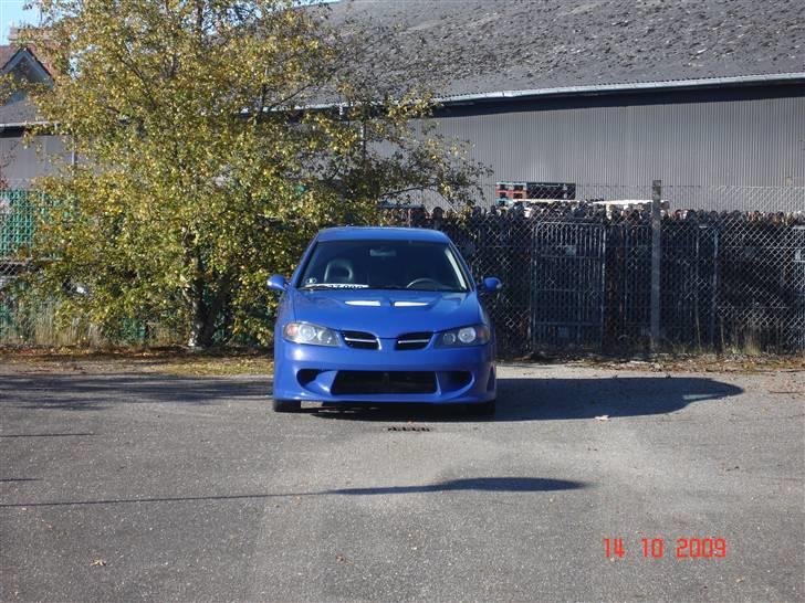 Nissan Almera 1,8 Sport SOLGT billede 7