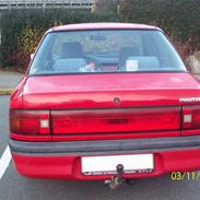 Mazda 323 1,3 glx 