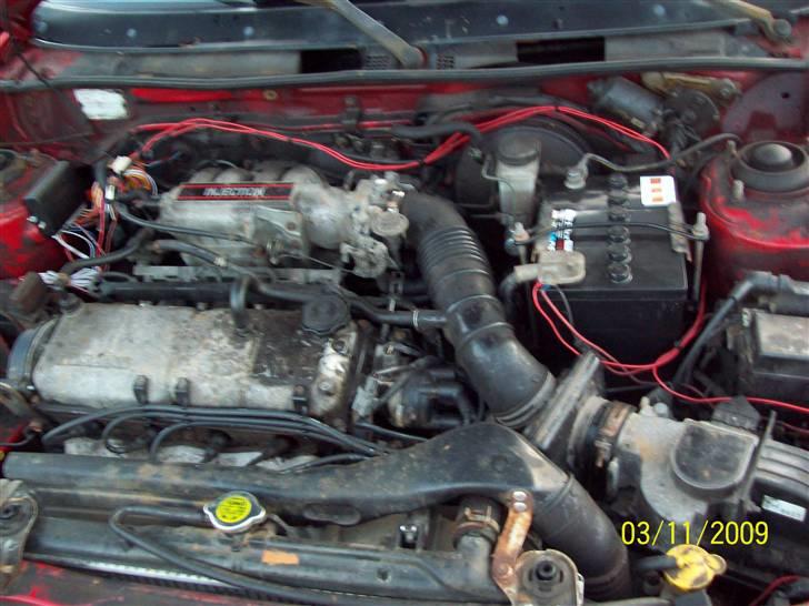 Mazda 323 1,3 glx  billede 12