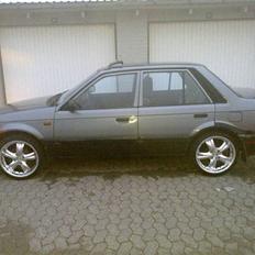 Mazda 323 Air **Solgt**