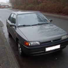 Mazda 323 1,3i kat *Solgt*
