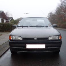 Mazda 323 1,3i kat *Solgt*