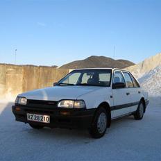 Mazda 323 DX (Byttet)