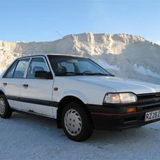 Mazda 323 DX (Byttet)