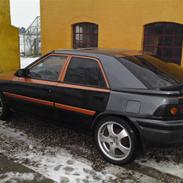 Mazda 323f bg *totalskadet*