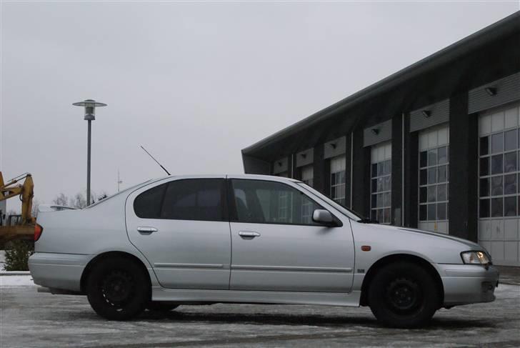 Nissan Primera 2.0 SE SOLGT billede 1