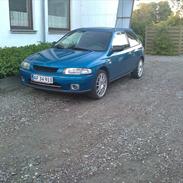 Mazda 323 pba totalskadet