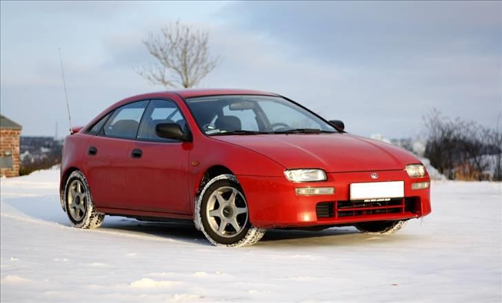 Mazda 323F BA glx SOLGT billede 1