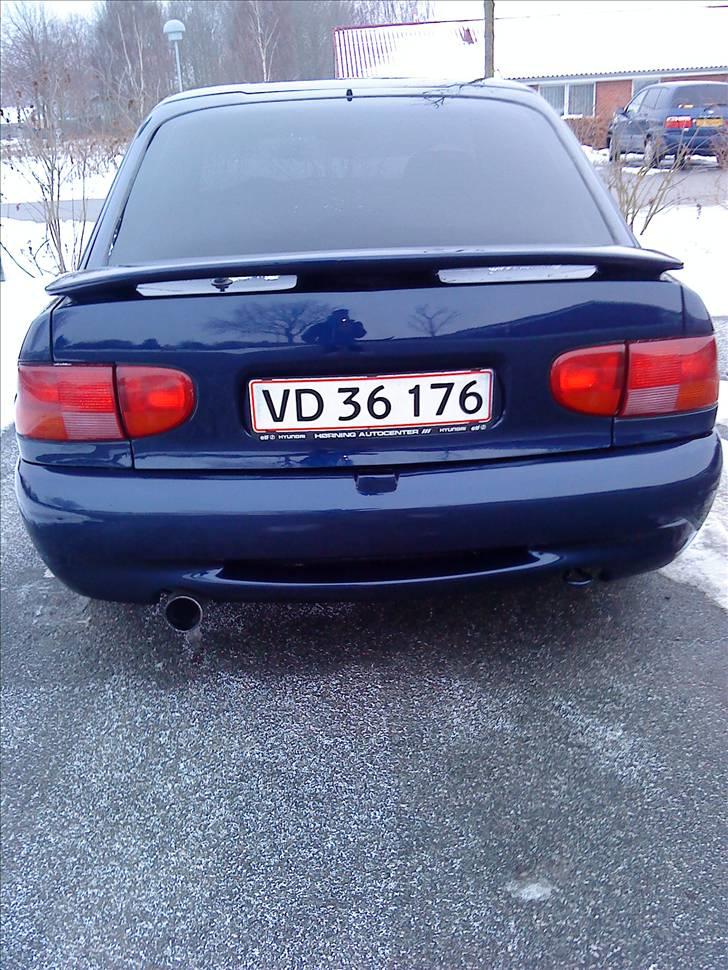 Ford Escort Monaco (DØD) - farvet kofangeren og spartelet bagklappen billede 12