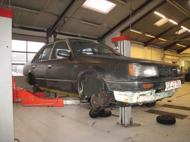 Mazda 323 skrottet R.I.P. billede 12