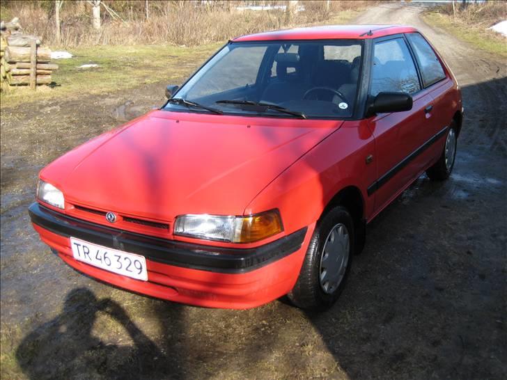 Mazda 323 Solgt  billede 1