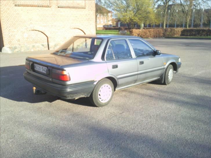 Toyota Corolla - Fra siden - beklager det skarpe sollys billede 4