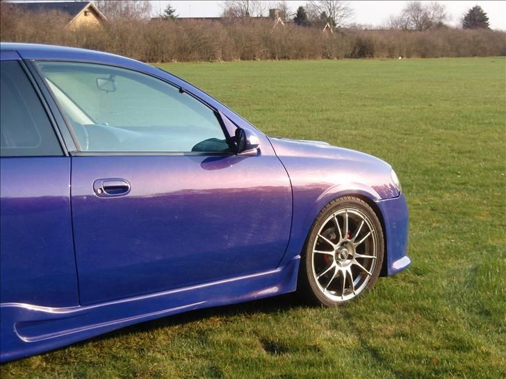 Nissan Almera 1,8 Sport SOLGT billede 8