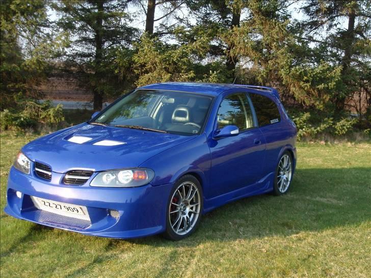 Nissan Almera 1,8 Sport SOLGT billede 9