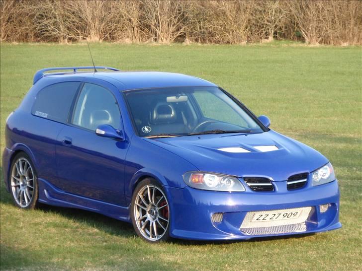 Nissan Almera 1,8 Sport SOLGT billede 12