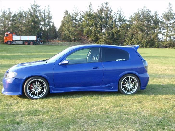 Nissan Almera 1,8 Sport SOLGT billede 13