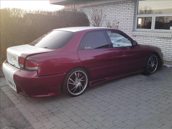 Mazda 626 *Hugget op* - Hele bilen, skråt bagfra. billede 8
