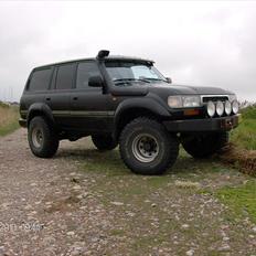 Toyota land cruiser solgt 