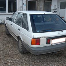 Nissan Sunny Traveller B12 solgt