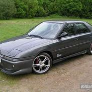 Mazda 323F **TOTALSKADET**