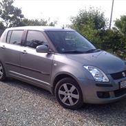 Suzuki Swift GLX 5d *Solgt*