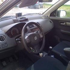 Suzuki Swift GLX 5d *Solgt*