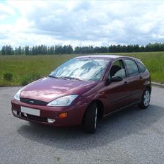 Ford Focus 1,6 hatch {Solgt