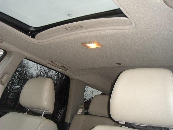 Honda CR-V 2,0 aut. Executive - Lækkert lyst interiør og soltag billede 9