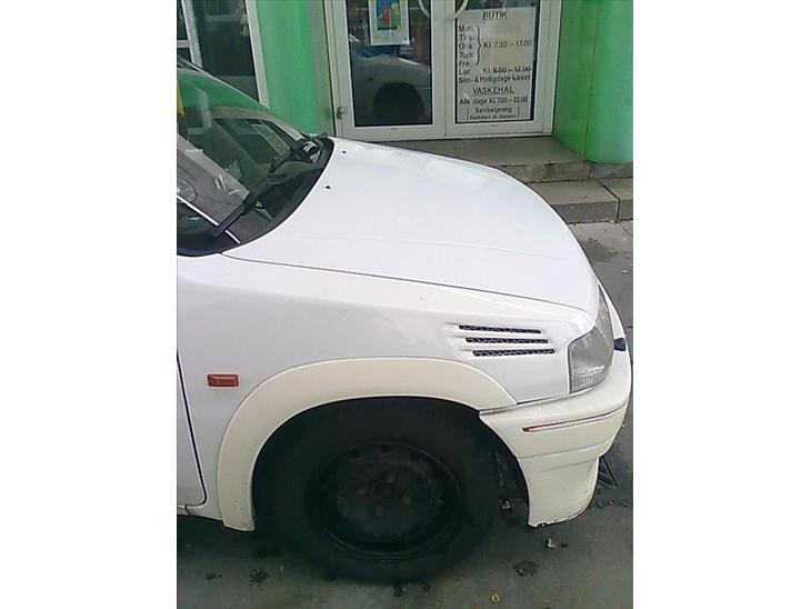 {{currentPhoto.altText}} billede {{currentPhoto.number}}