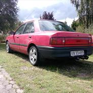 Mazda 323 i