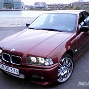 BMW 318i solgt