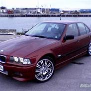BMW 318i solgt