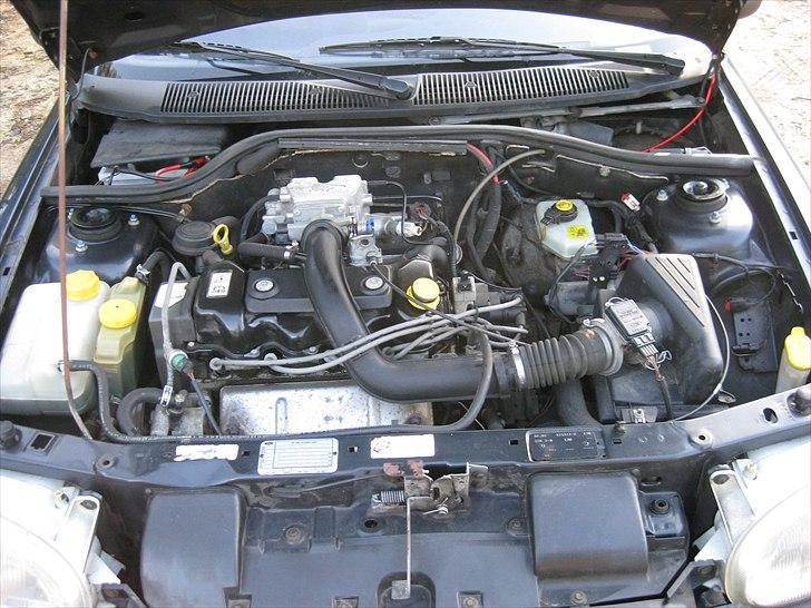 Ford Escort 1.4i solgt billede 6