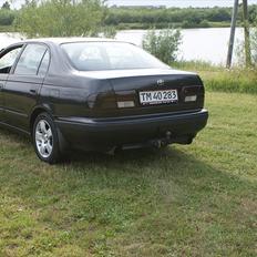 Toyota carina e 2,0 gli  solgt