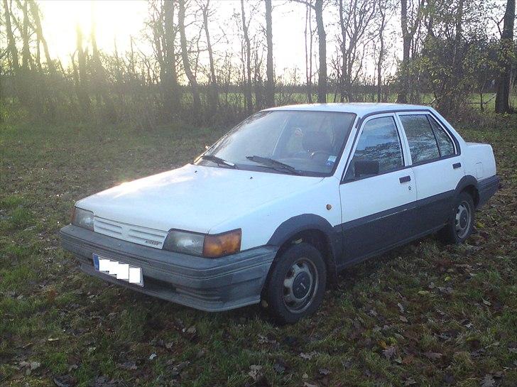 Nissan sunny 1.3lx sedan solgt billede 14