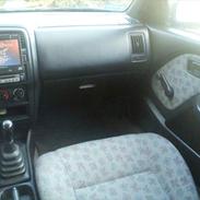 Nissan almera 1,6 GX  Solgt!