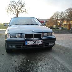 BMW 320i solgt