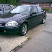 Honda civic 1,4 is **solgt**