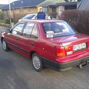 Suzuki Swift 1.3 GX Sedan