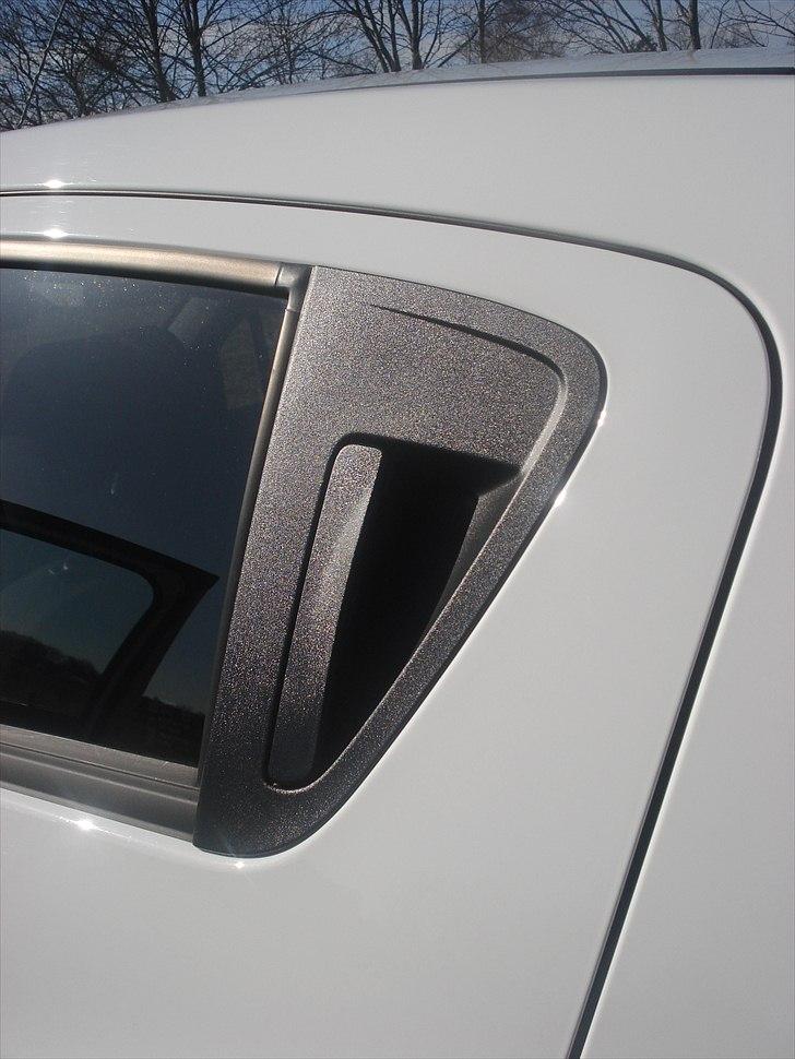 Chevrolet Spark Life+ - En fed detalje efter min mening, man lægger ikke mærke til dørhåndtaget sidder der :) billede 9