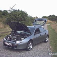 Mazda 323 F  Solgt.....